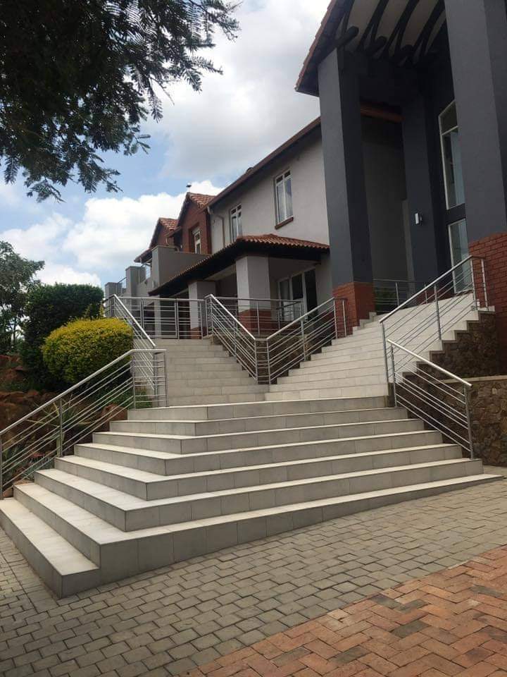 Stainless steel entrance balustrades installed by Tshwane Metal